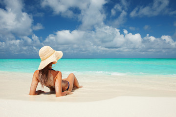 Young fashion woman relax on the beach