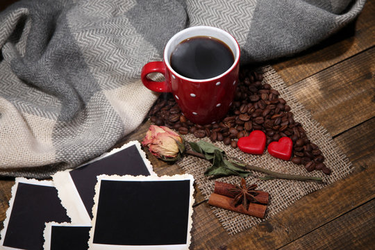 Composition with coffee cup, decorative hearts, plaid spices