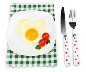 Scrambled eggs with bread on plate, on color napkin
