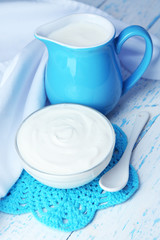 Dairy products on wooden table background