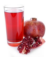 Ripe pomegranates with juice isolated on white