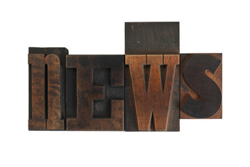 news, word written in vintage printing blocks