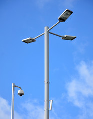 Fototapeta na wymiar Street lamp and CCTV with big blue sky