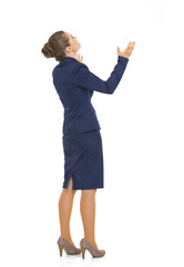 Full length portrait of business woman begging