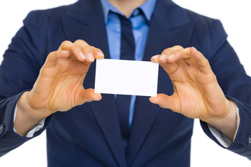 Closeup on business woman showing business card