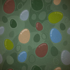 Seamless Easter pattern with eggs on green camouflage back.
