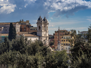 Fototapeta na wymiar Trinita dei Monti church on top of the Spanish steps in Rome