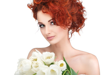 beautiful young redheaded girl with white tulips