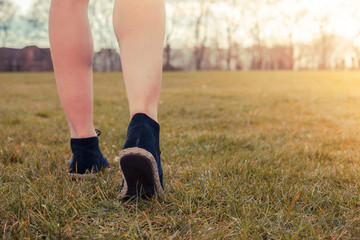 Young woman walking in the park