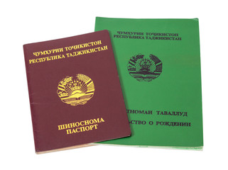 Tajikistan passport and birth certificate isolated on the white