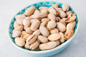 Fototapeta premium Bowl of pistachio nuts