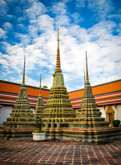 Fototapeta premium The pagodas of Wat Pho temple at Bangkok, Thailand
