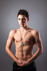 Fototapeta premium Portrait of young bodybuilder man