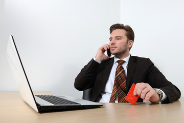 Young businessman working in the office