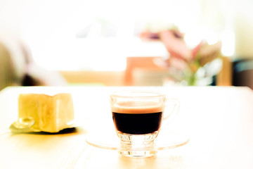 Hot coffee on wood