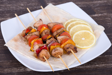 Grilled meat and vegetables on skewer