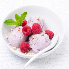 berry ice cream with fresh raspberries, top view