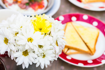 Fototapeta na wymiar decorated flower and toast