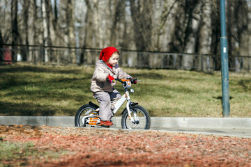 Cute little girl on bicycle