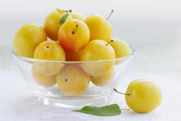 plum in transparent bowl