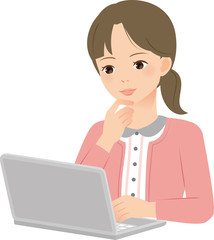 自宅でノートパソコンを使う女性