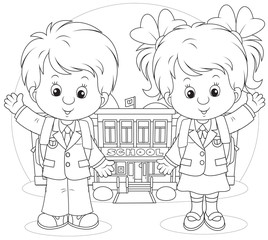 Schoolgirl and schoolboy before a school