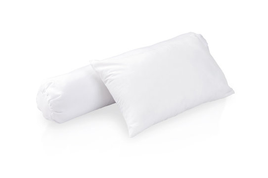 white pillow and bolster