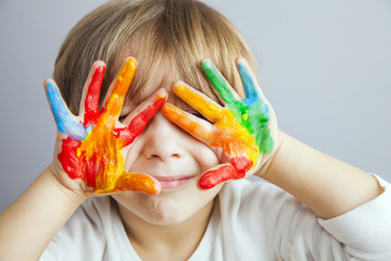 hands painted  in colorful paints