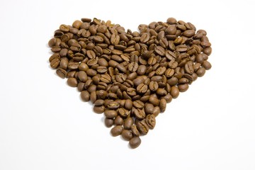 Heart shape formed of roasted coffee beans