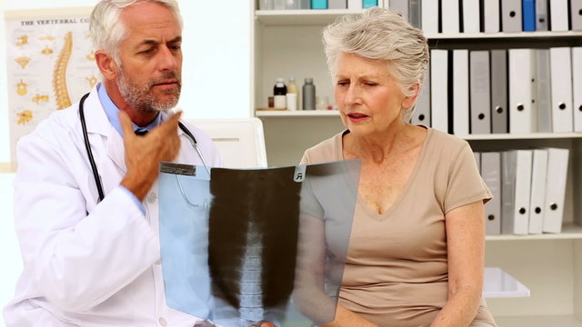 Doctor explaining an xray to patient
