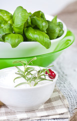 salami with spices on white wooden table