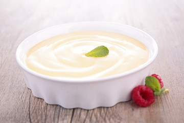 vanilla cream dessert and berries