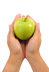 apple in woman hands close up