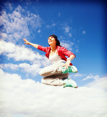 beautiful dancing girl jumping