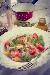 Noodles with asparagus in cream-cheese sauce