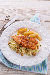 grilled chicken, cabbage salad with nuts and chips