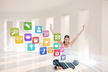 Cheering blonde using laptop with app icons