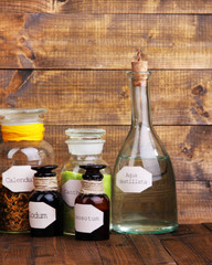 Historic old pharmacy bottles with label   on wooden background