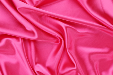Pink silk background. Texture.