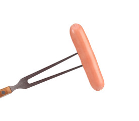 Fresh sausage on a fork.