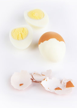 Peeled boiled egg isolated on white