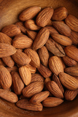 Almonds in bowl, close-up