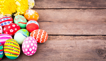 Easter eggs on wooden background