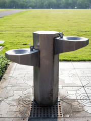 Public cold water machine in park. - 63114976