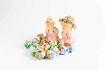 Group of colorful candy Easter eggs with duck