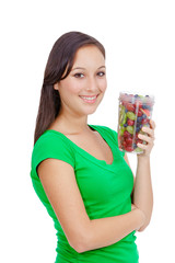 Healthy lifestyle - Fit young woman eating fruit