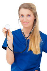 Female nurse or doctor showing stethoscope.
