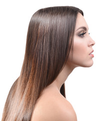 Obraz premium Beautiful young woman with long hair isolated on white