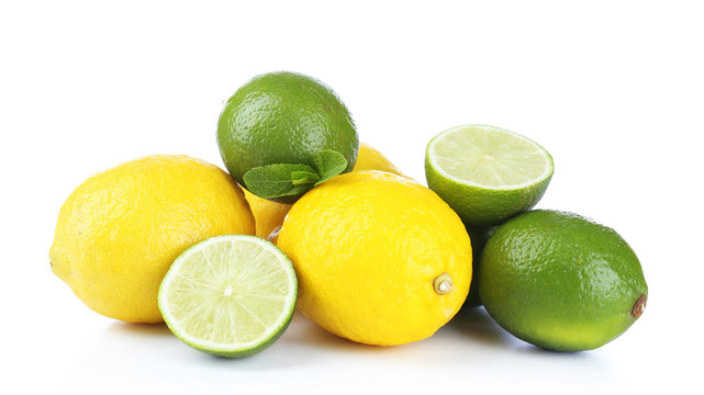 Lemons and limes, isolated on white