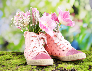 Beautiful gumshoes with flowers inside